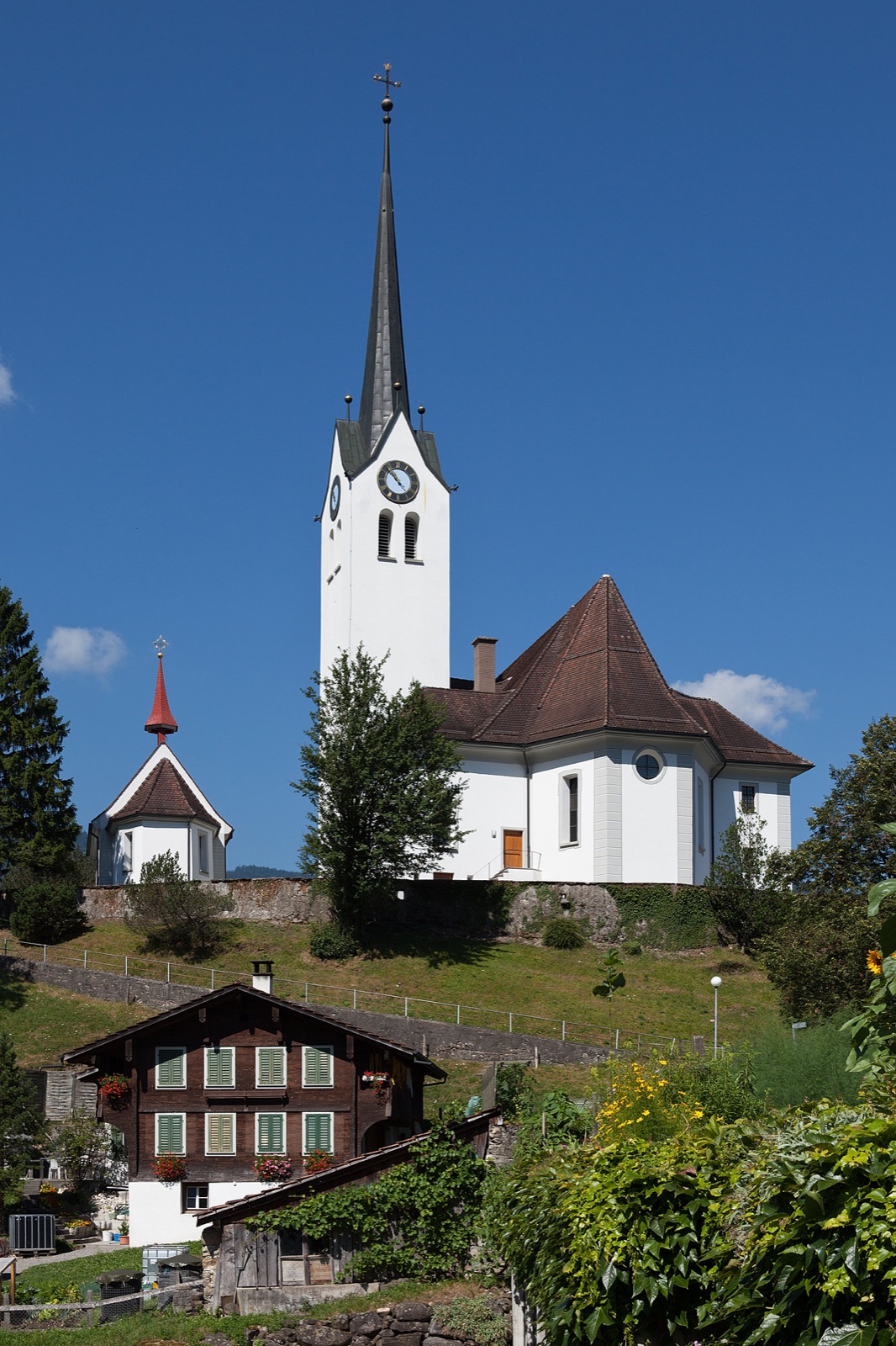 Parish church of St. Lawrence with ossuary and rectory in Switzerland