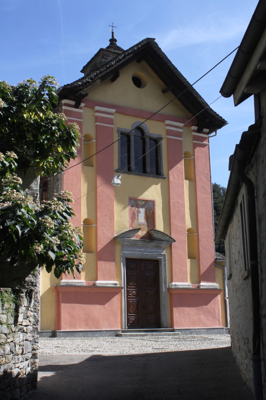 Saints James and Philip parish church complex with ossuary and parish house in Switzerland